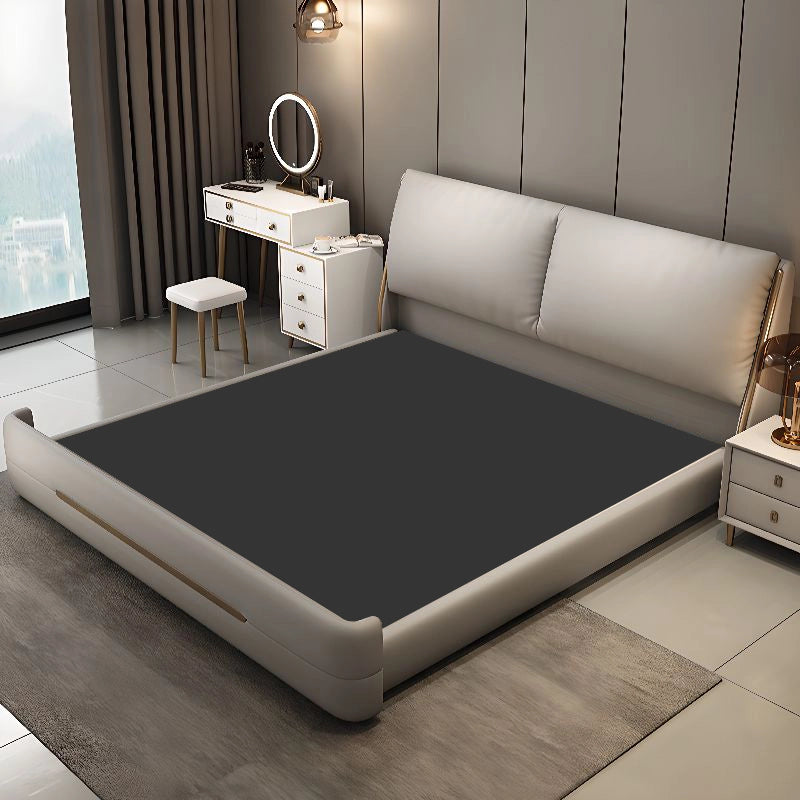 Its low-rise bed frame is built from sturdy neem wood and plywood, finished with smooth edges and a gold-accented footboard.