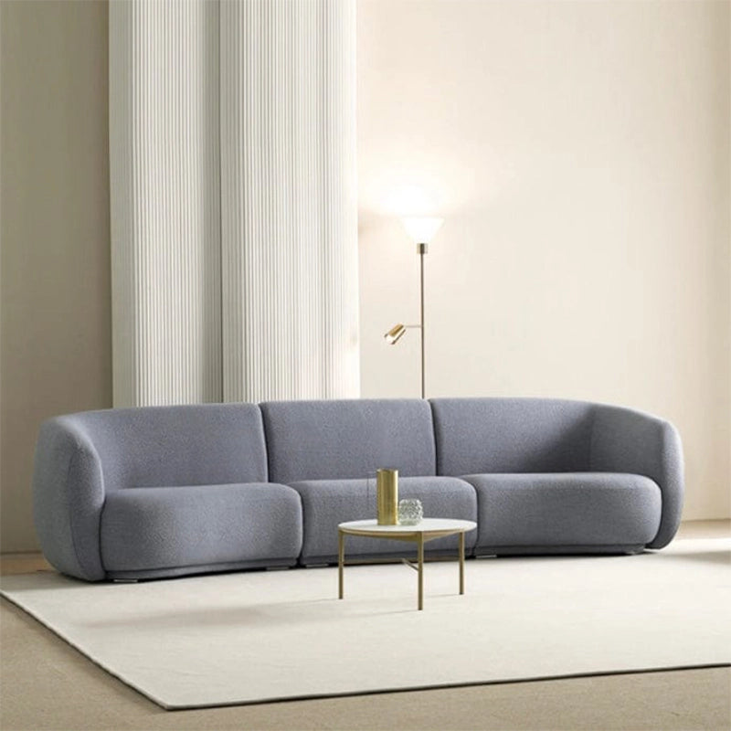 The smooth, plush upholstery and overstuffed deep seating make it an inviting lounge sofa.