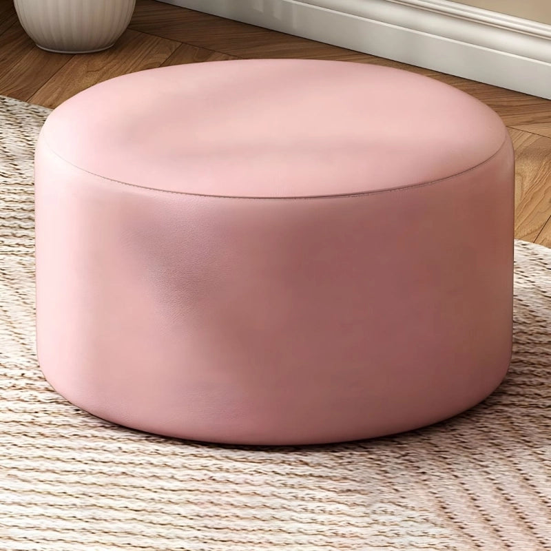 A soft seat that doubles as a coffee-table stand-in or robot-vac friendly accent, this pouffe ottoman also fits transitional styling. 