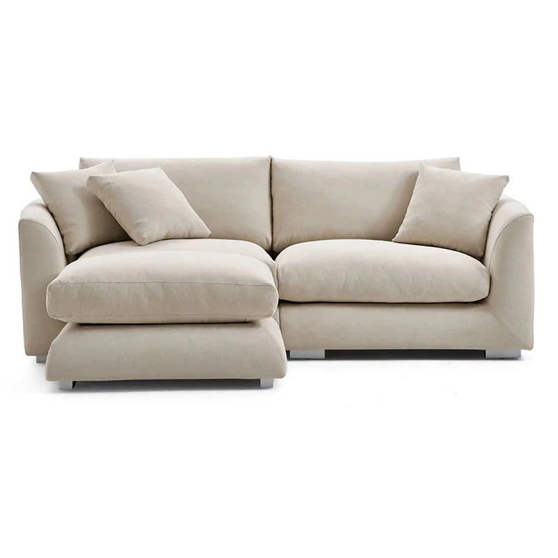 With a minimalist silhouette, rounded edges, and plush cushions, this contemporary sofa design brings a calm, luxurious vibe.