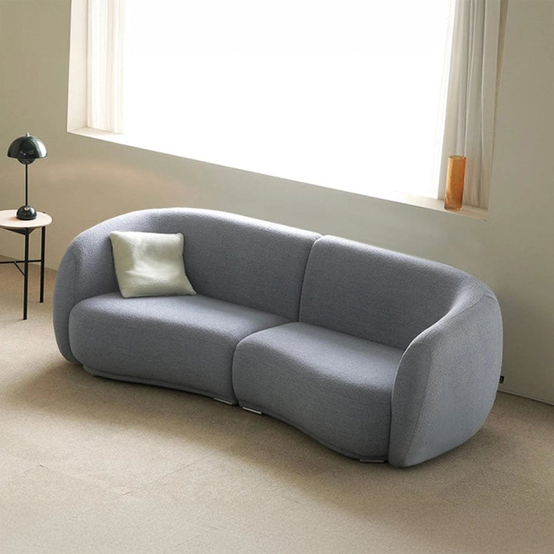 deal for modern Indian homes, this fabric sofa features a low-profile modular build, deep seating, and seamless soft-edge design, making it a pet-friendly, family-safe choice.