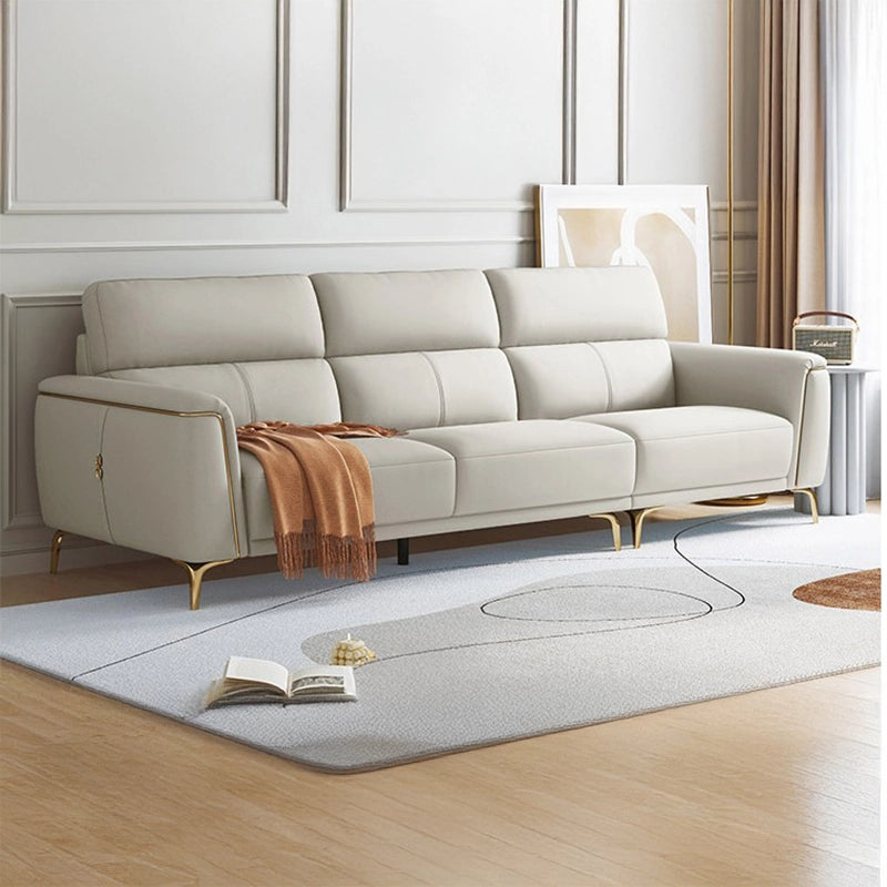 he plush segmented cushioning provides ergonomic comfort, while the gold-tone legs and trim add luxe appeal. 