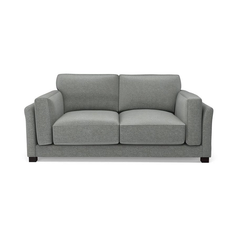 Designed with modern minimalism in mind, this premium sofa features deep seating, broad arms, and plush cushions for unmatched comfort. 