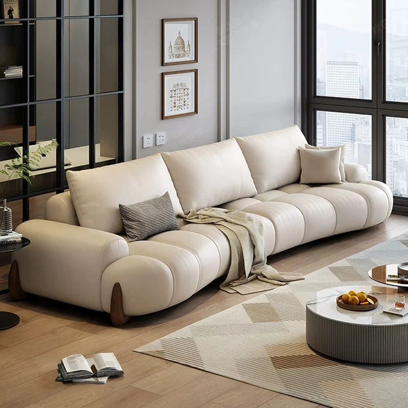 Crafted for the modern Indian home, this Rhodes settee combines pure leather elegance with plush comfort in a modular l-shaped form.