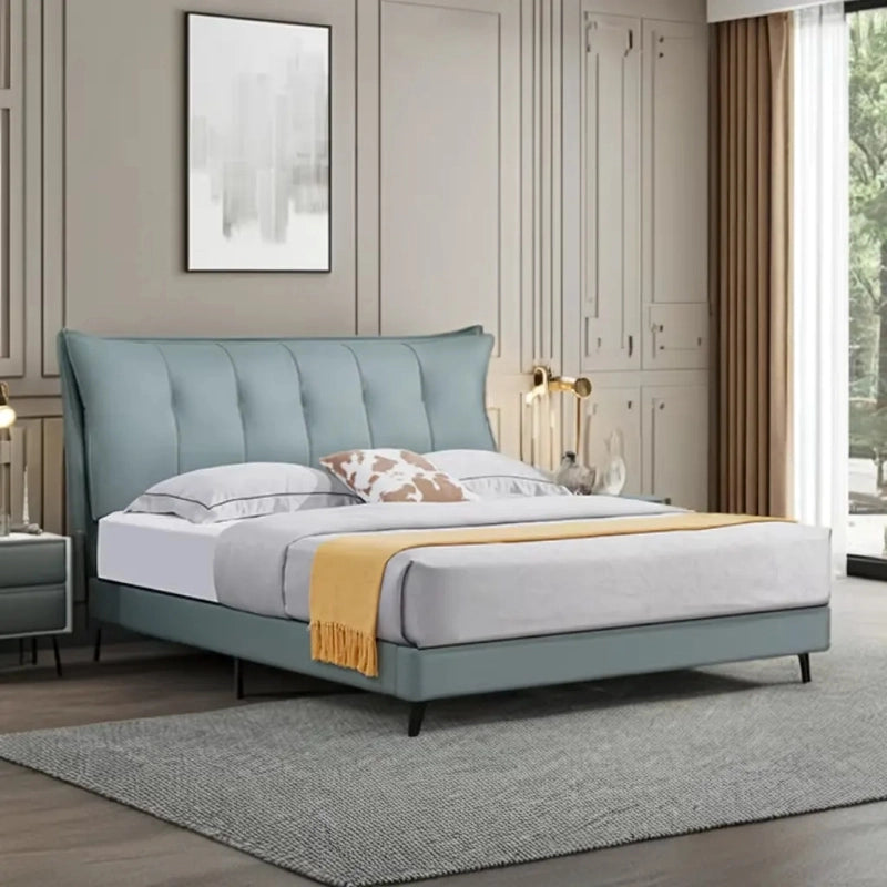 Wingback headboard in teal shade, master bedroom bed design, new bed design look