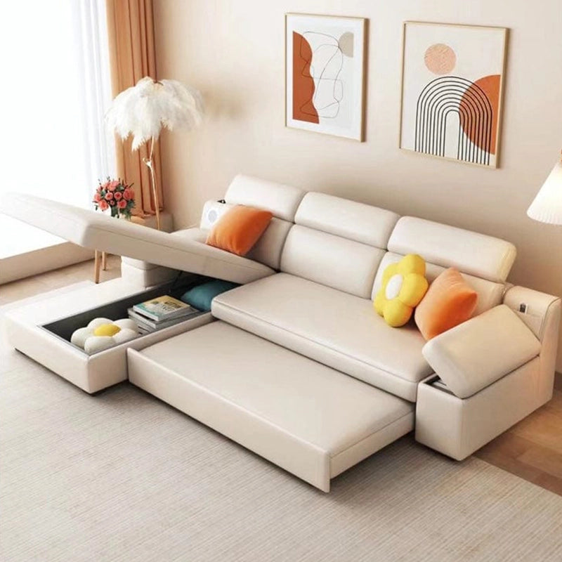 Ivory leatherette pull-out sofa with orange pillows – sofa cum bed bangalore, convertible couch sleeper