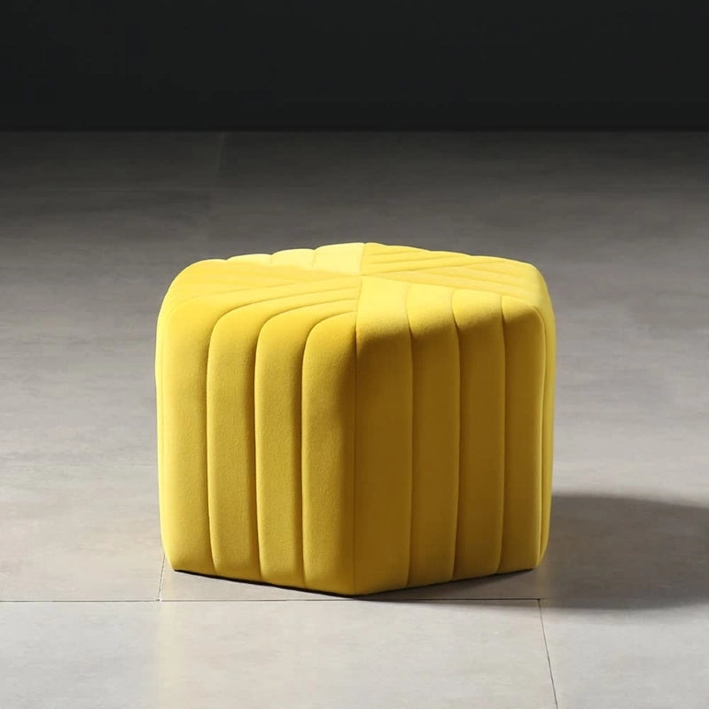 A sculpted pouffe that serves both as décor and function