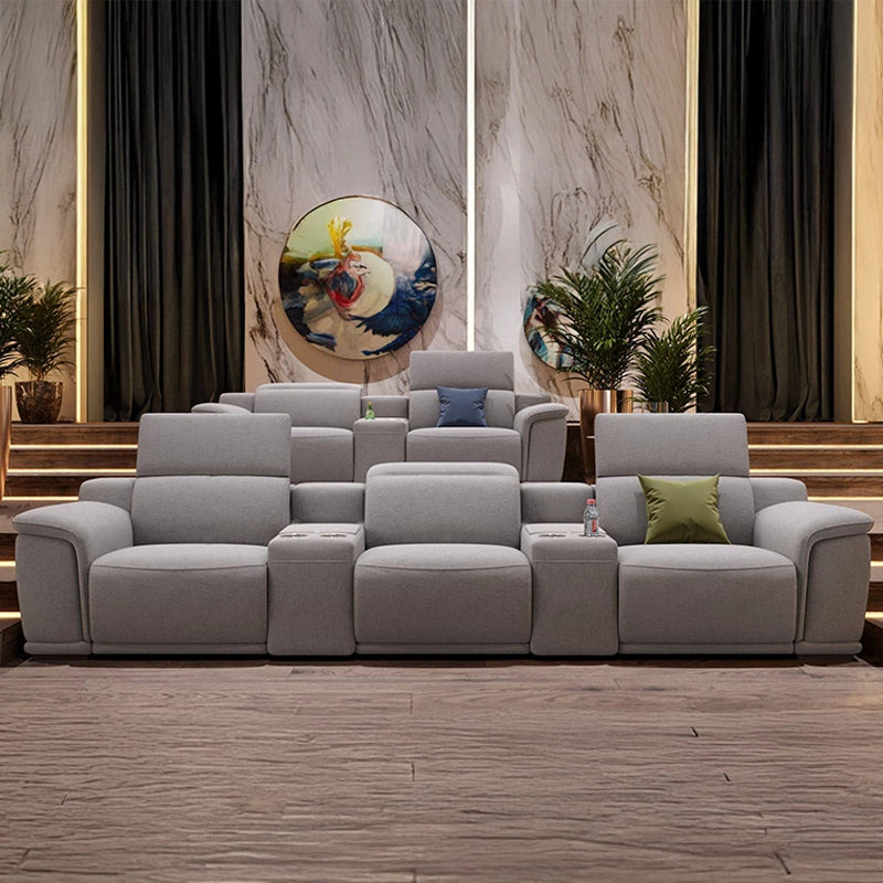 Power recline in action with home cinema recliner and theater seating couch, grey