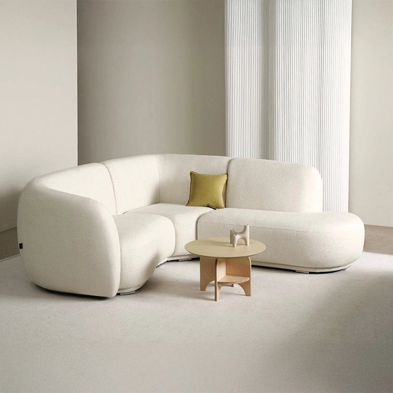 Modern curved silhouette with bold rounded form – contemporary sofa design, latest sofa design, off-white couch