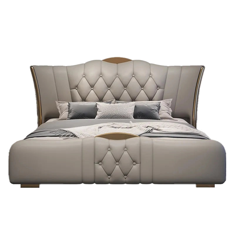 Crafted for discerning homeowners, this modern upholstered bed combines a dramatic tufted wingback design with a sculpted silhouette and short wooden legs for bold visual presence.
