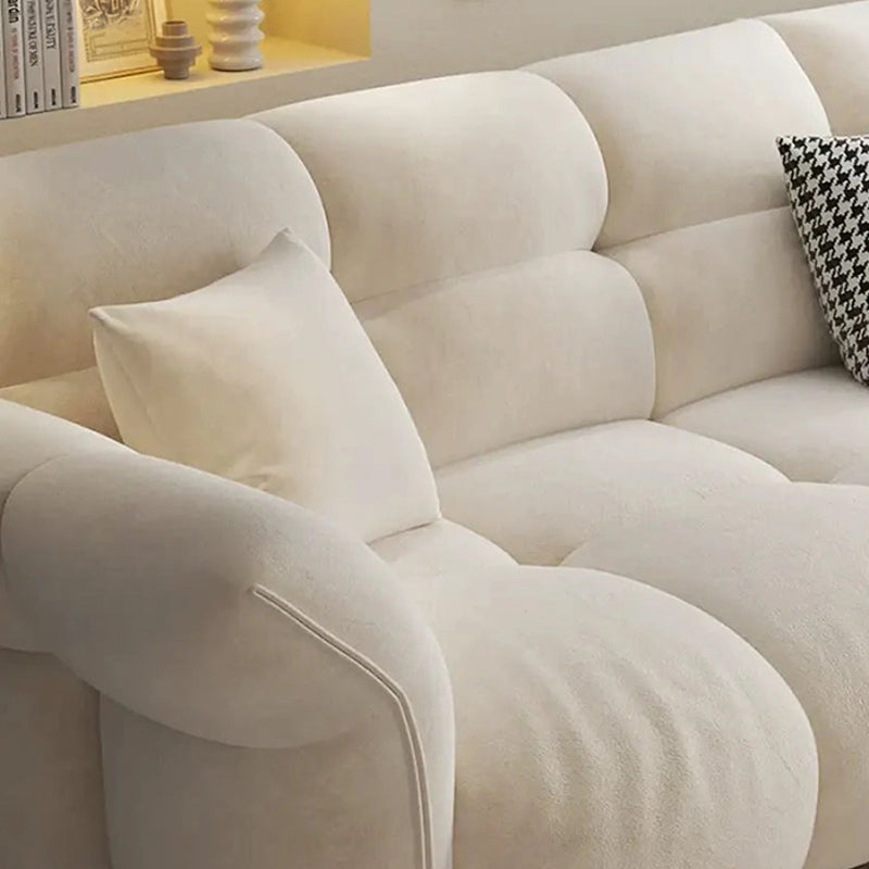 This modern 4 seater settee blends soft-touch materials with contemporary design lines, making it ideal for upscale lounge settings