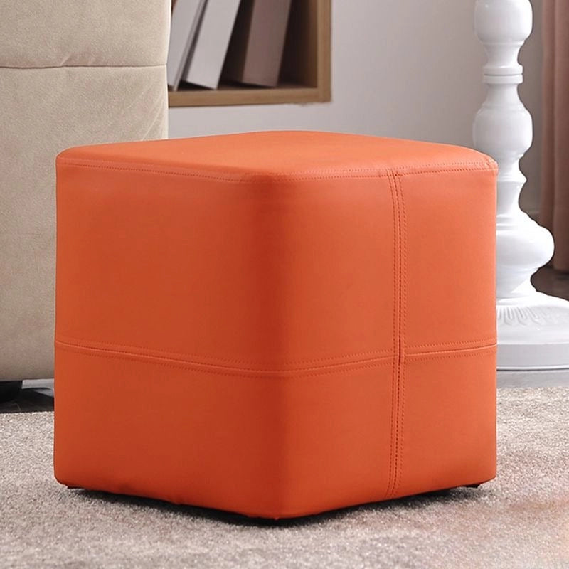 Clean stitched orange pouffe ottoman look, ottomans and benches design, low silhouette
