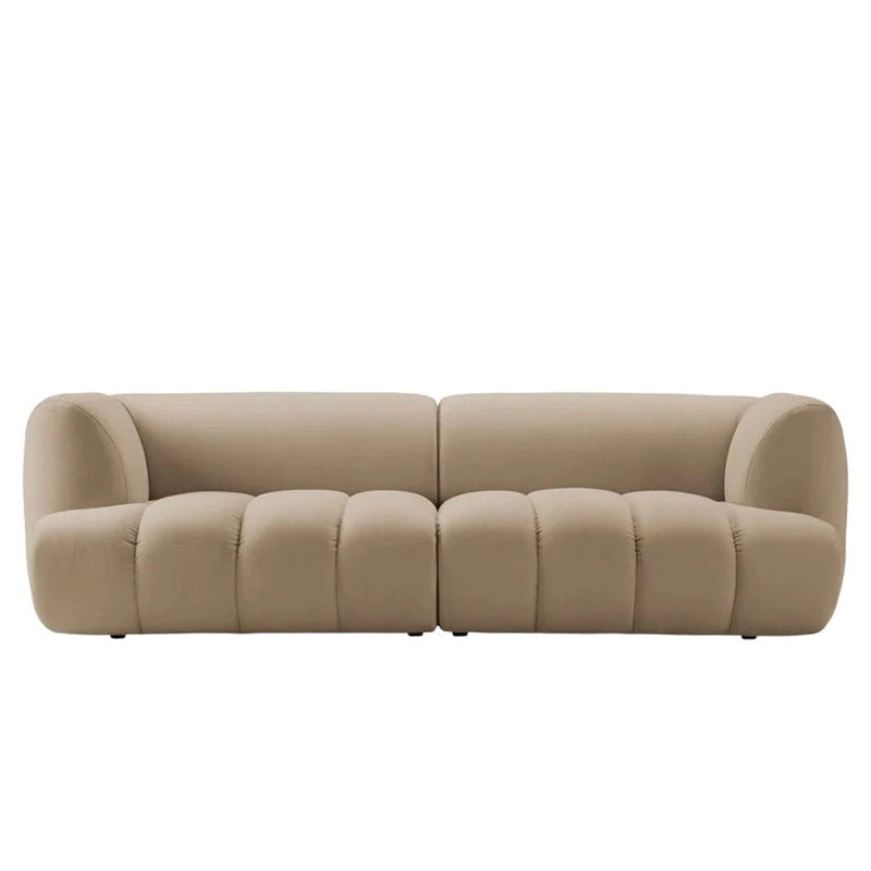 Rhythmic channel tufting and grounded silhouette, sofa design set in beige