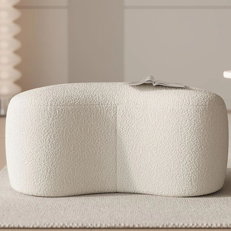 Tactile bouclé pouffe ottoman showing footstools and ottomans design with seamless edges