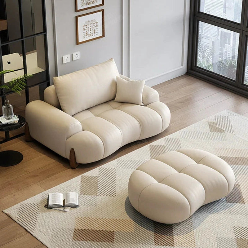 he genuine leather upholstery resists wear and is easy to clean—perfect for families and pet owners alike