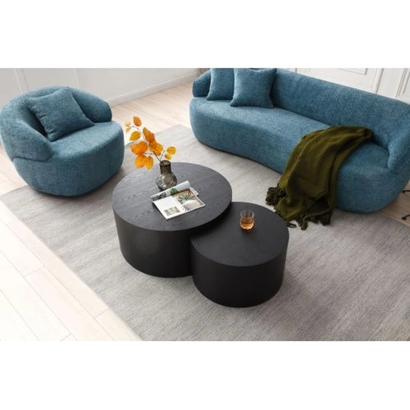 Upholstered in richly textured boucle, the Lustra settee features an armless organic design with flowing lines and soft curves.