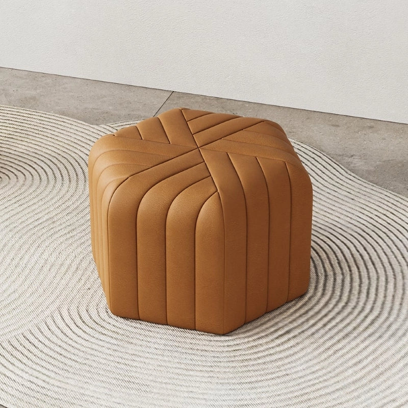 Its softly rounded edges and firm cushioned top make it ideal as a pouffe stool or ottoman seating option.