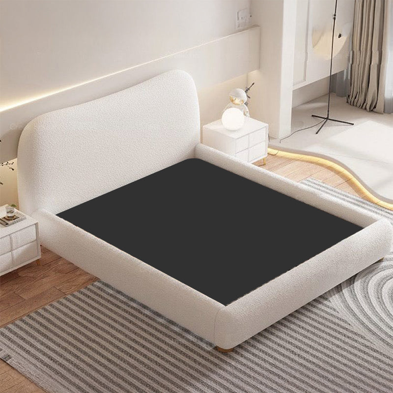 Upholstered bed with rounded base contours – bed online, modern bed design