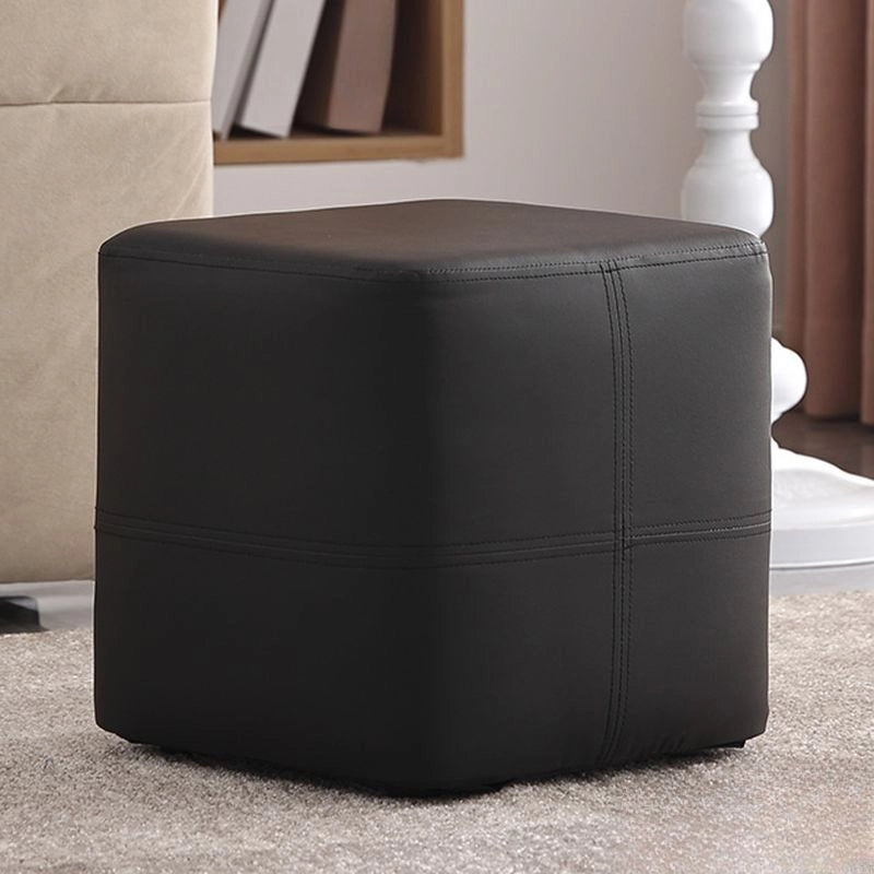 Rounded cube ottoman in black tone, ottoman seating design, footrest profile