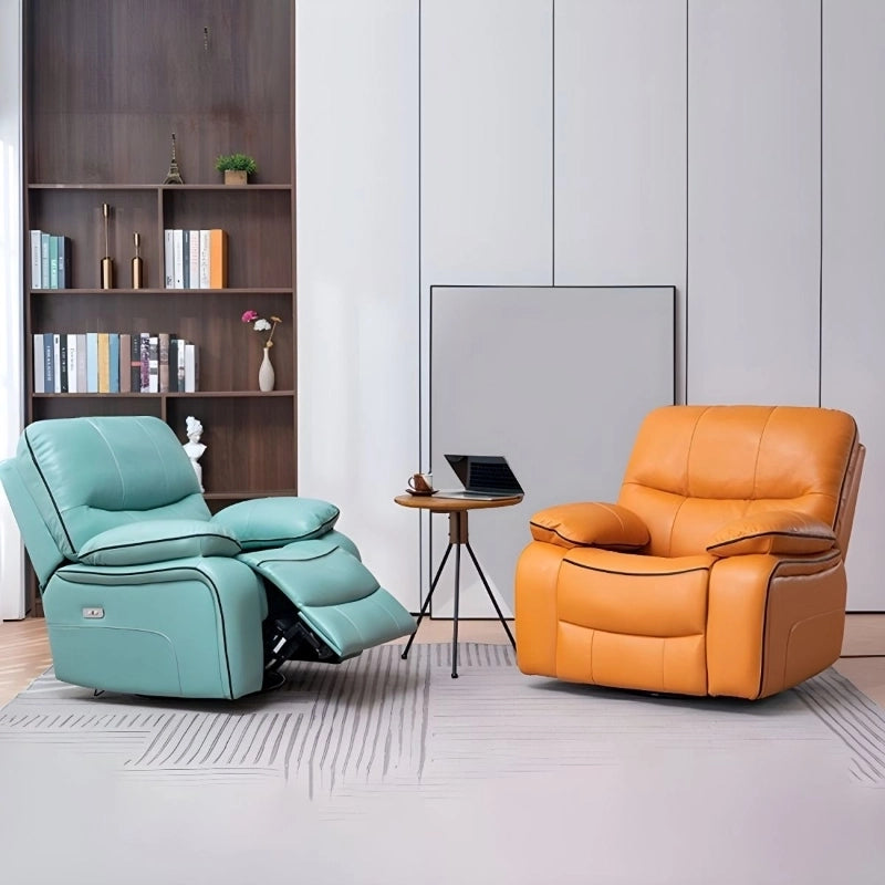 This mint green faux leather recliner blends indulgent cushioning with modern usability.