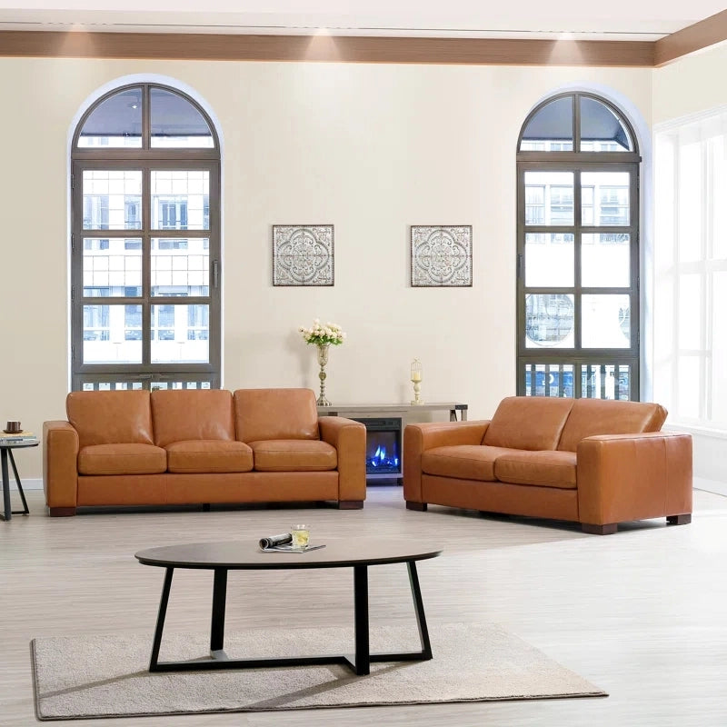Plush cushions + designer sofa design + pure leather sofa + rich brown tone