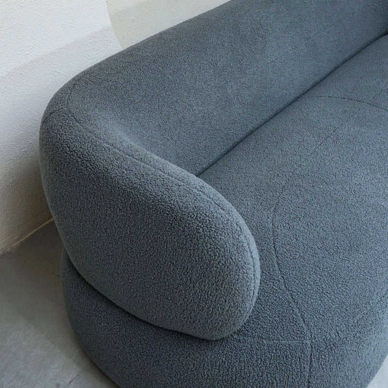 Boucle fabric couch with curved seat form, featuring order sofa online and living room couch charm