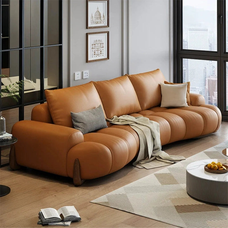 Wide stitched tan settee design with 3 seater sofa layout and premium sofa frame