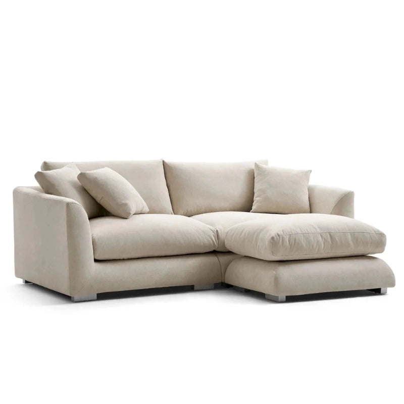 Designed for both elegance and everyday comfort, this fabric sofa features soft beige upholstery, deep seating, and a sleek modern sofa design that fits perfectly in any living room sofa set layout. 