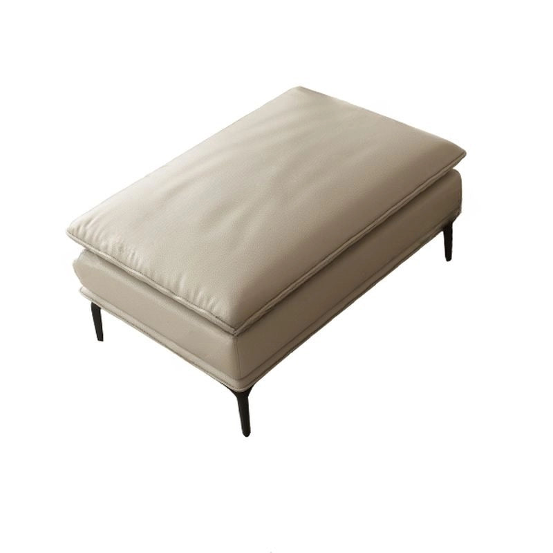 With a rectangular form, medium-firm cushioning, and neatly piped edges, it transitions easily between footrest, stool, and coffee-table substitute.