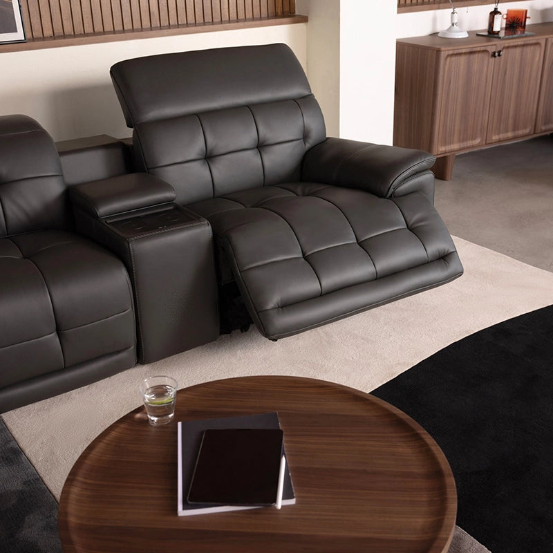 Console close-up photo showing home cinema recliner sofa, home theater chairs, dark brown leatherette