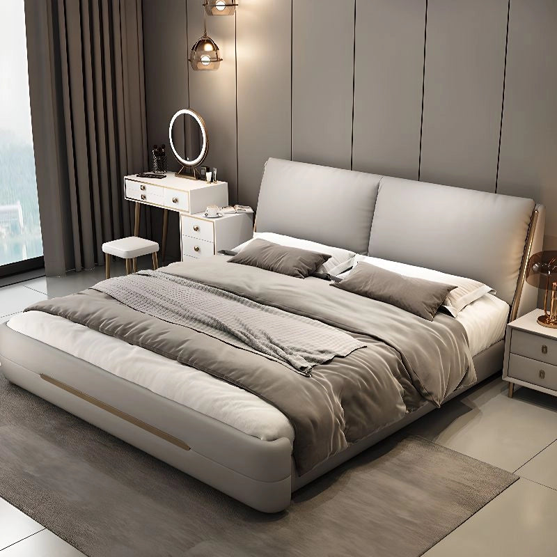 Designed with a premium Nova fabric in a muted grey tone, it showcases a tall ergonomic headboard, plush padding, and a seamless profile.