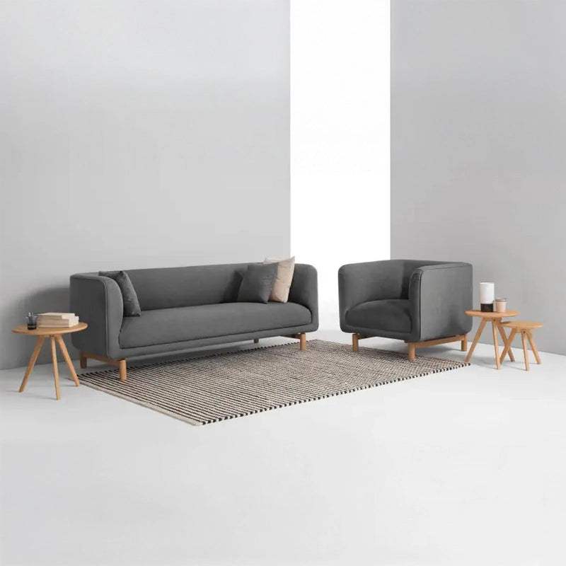 With a compact rectangular shape and Scandinavian curves, this couch suits both lounge and studio spaces.